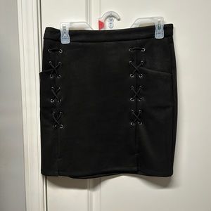 Black suede with Kris Kross, accent and pockets.